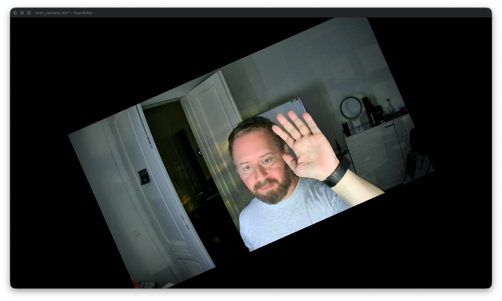 A live USB camera feed rotated counter-clockwise as a Rayslides video object